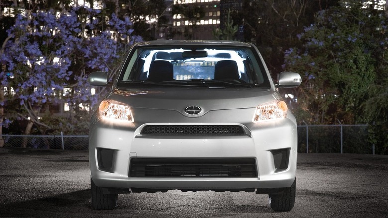 A silver 2012 Scion xD