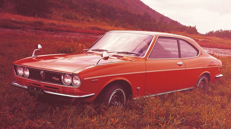 Mazda Capella/RX-2 in a field