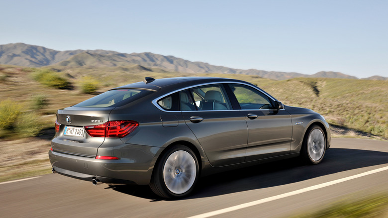 BMW 5 Series Gran Turismo rear 3/4 view while being driven at speed