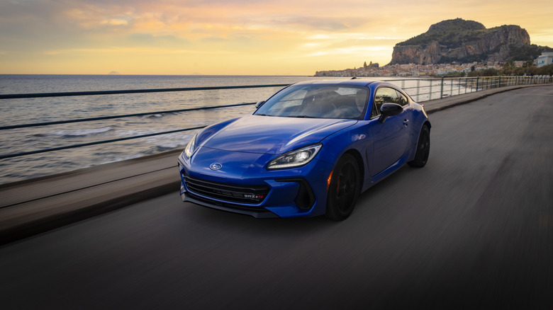 2025 Subaru BRZ driving down a road