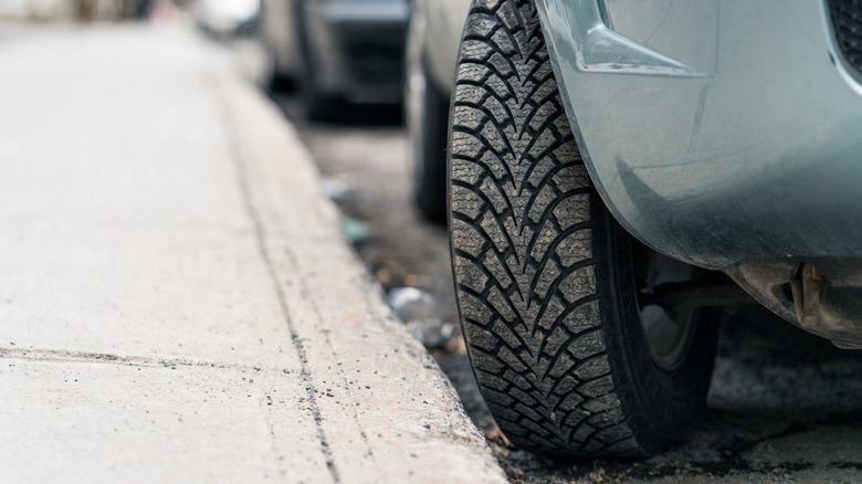 closeup of a car parked along a curb
