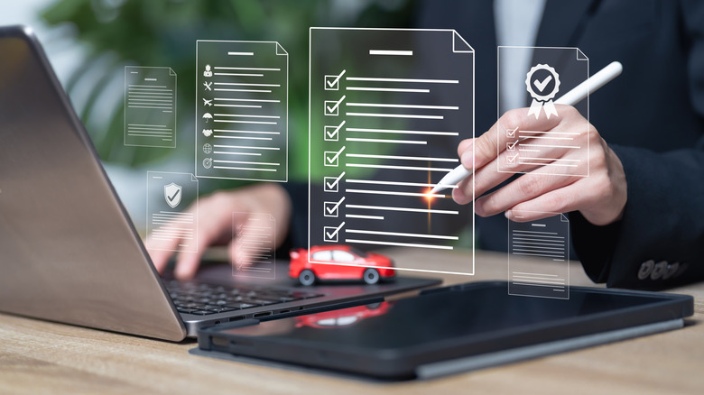 man looking at a car listing online