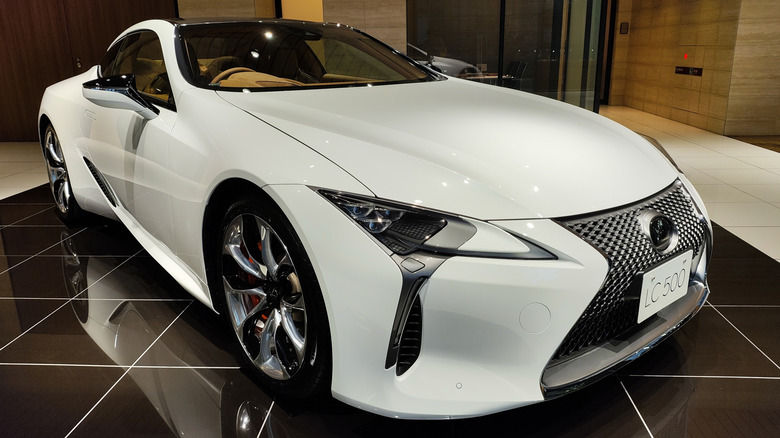 White Lexus LC500 front 3/4 view in show room