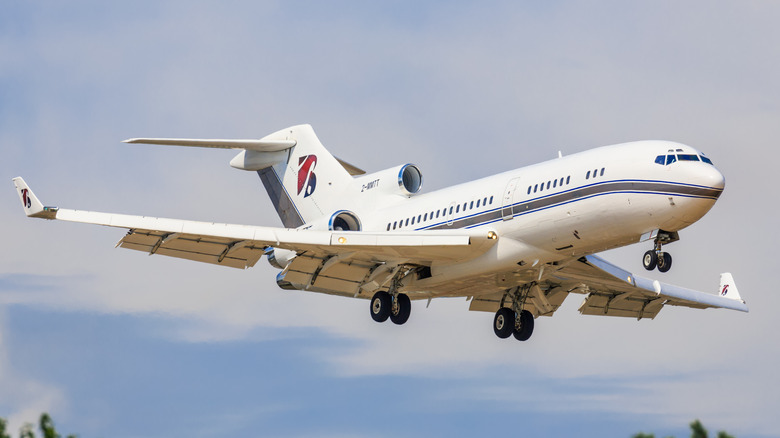 A Boeing 727 taking off from Genf Airport in Switzerland