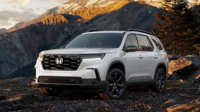 2025 Honda Pilot front 3/4 view mountainous landscape