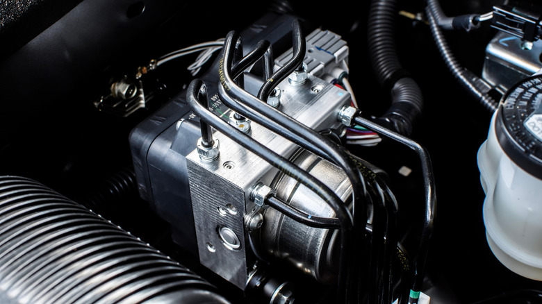 Close-up of an ABS (anti-lock braking system) module installed in a car.