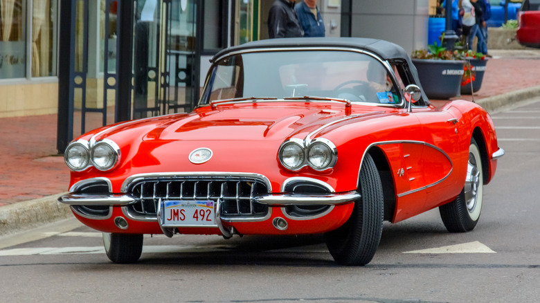 Chevrolet Corvette 1958 driving downtown