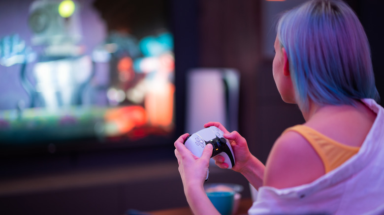 Person playing PS5 