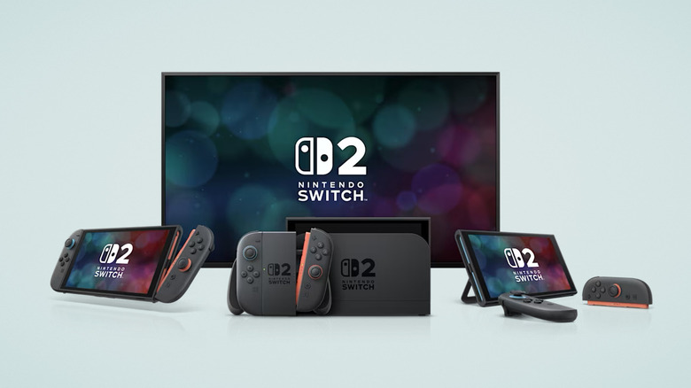 Several Nintendo Switch consoles in front of a television, white background