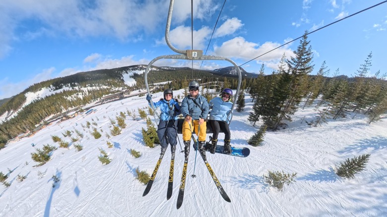 Group photo on a ski lift captured with the Insta360 X5.
