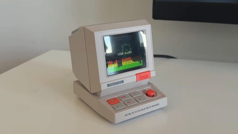 A close up shot of the Divoom MiniToo Retro Computer Speaker