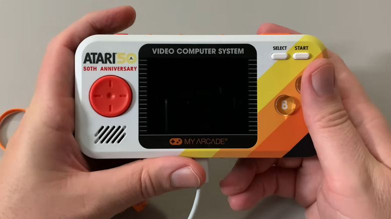 A close up shot of the My Arcade Atari Pocket Player Pro