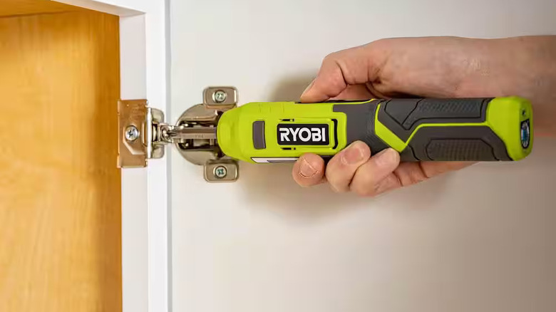 Man uses Ryobi Cordless Screwdriver