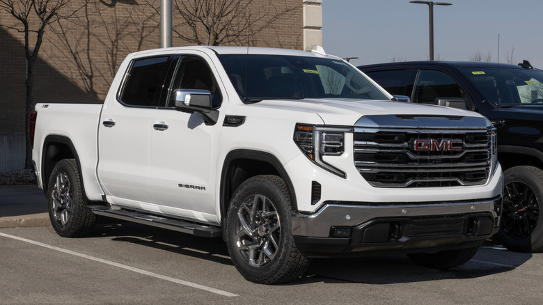 A white 2025 GMC Sierra 1500 parked in a parking lot