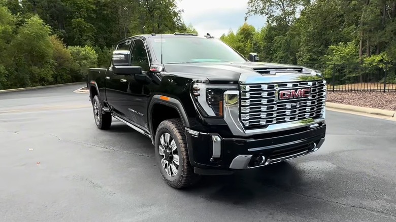 A Black 2025 GMC Sierra Denali 2500HD parked