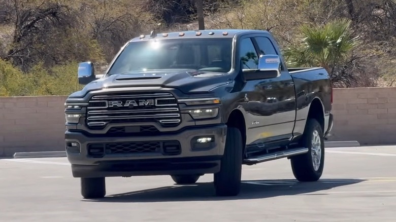 A 2025 Ram 2500 driving into a parking area