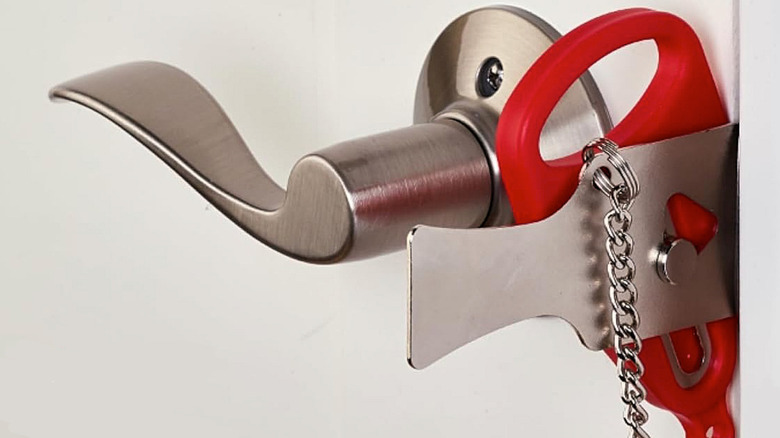 The Addalock portable door lock attached to a door.