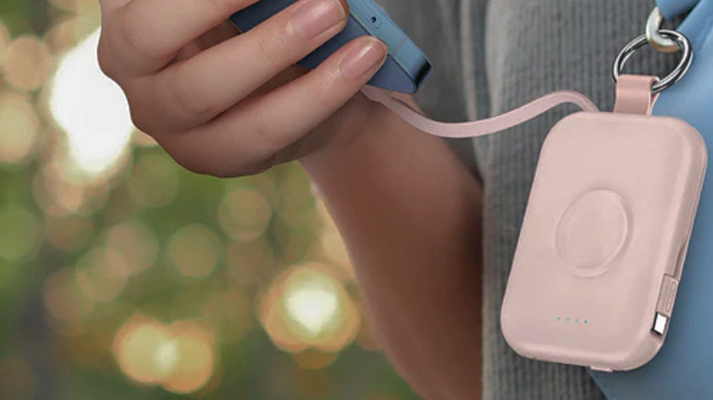 A Rorry CharmGo D2-5000mAh attached to a bag.
