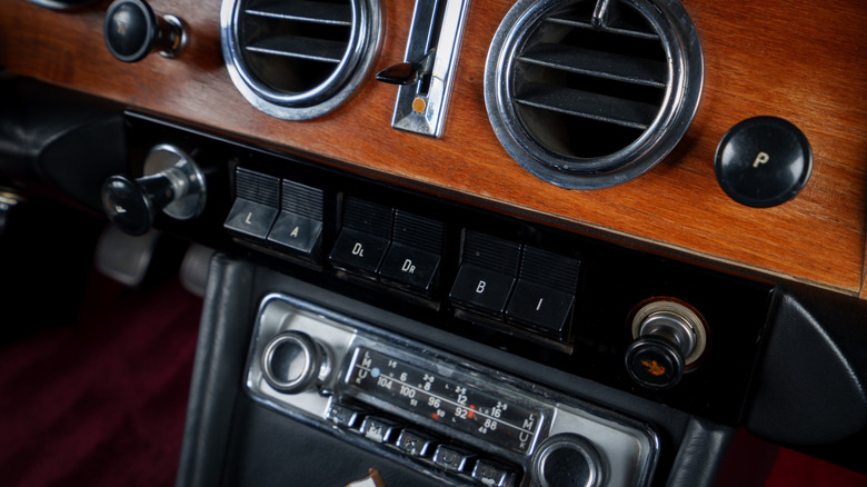 An AM radio on a car dashboard,