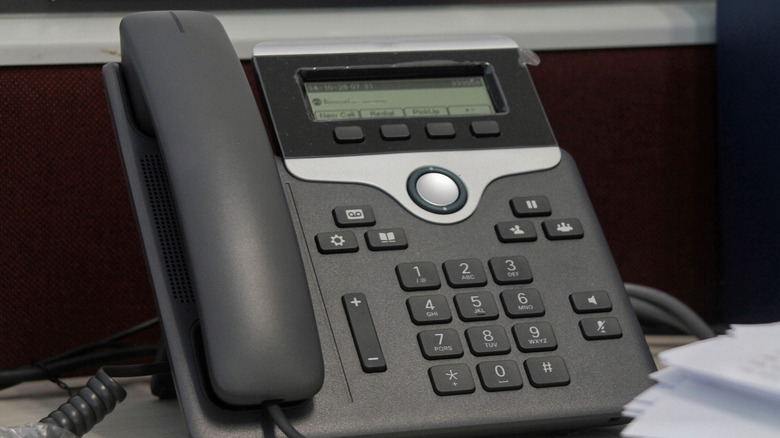 Office Desk Landline Phone With Corded Handset And Digital Display.