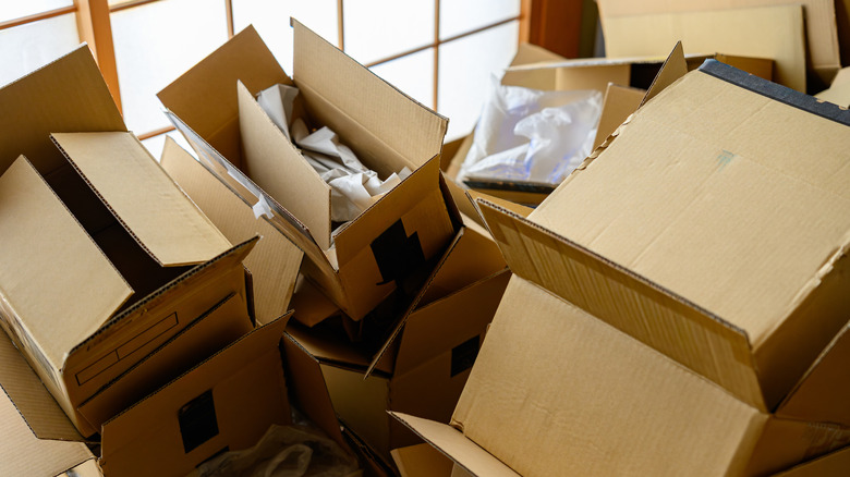 A large pile of empty boxes.