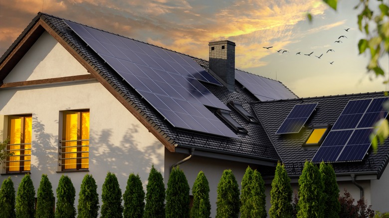 Solar paneled house at sunset