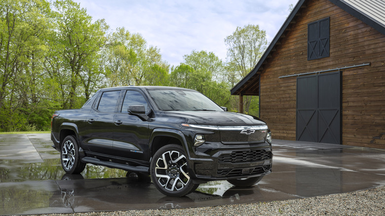 The Chevrolet Silverado EV in black, front 3/4 view