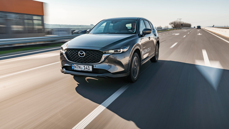 A Mazda CX-5 cruising along a highway