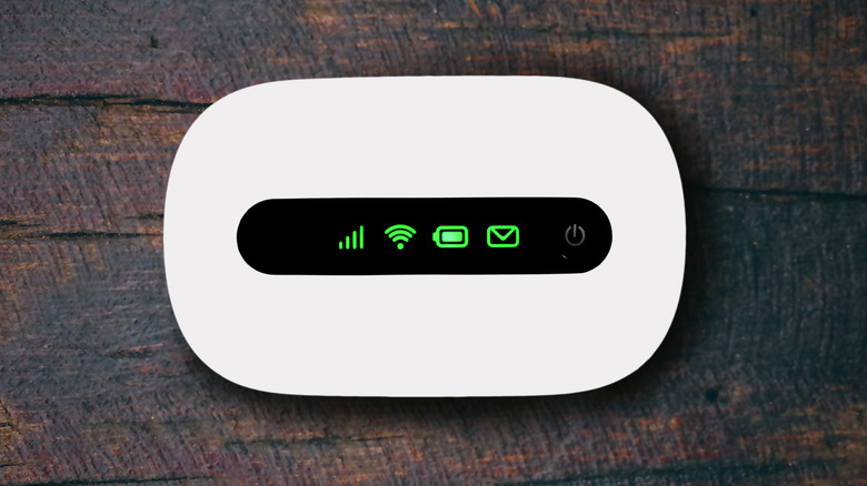 A 4G router ready to share wi-fi with a phone