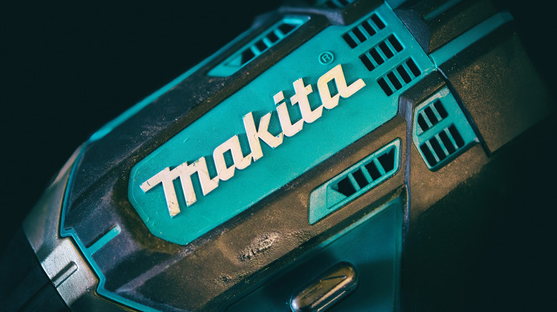 Makita branding on tool in teal coloring