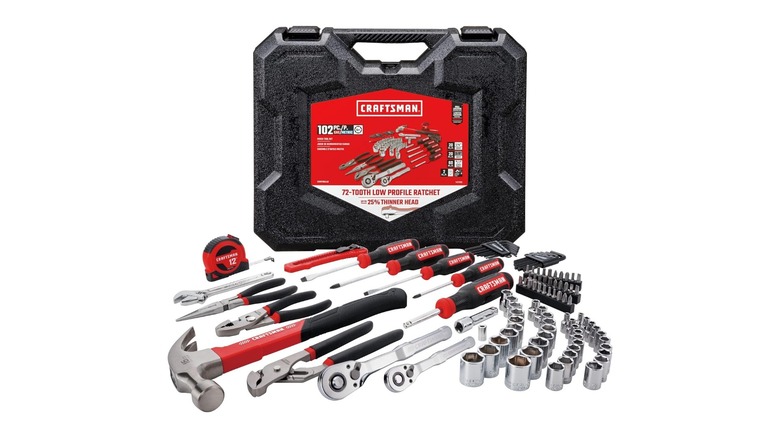 Assorted instruments on a white background in front of the Craftsman Mixed Tool Set box