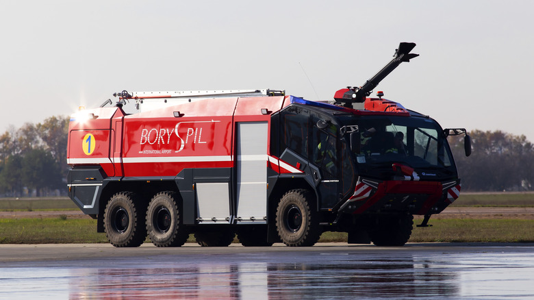 A red rosenbauer panther (not from the movies) displayed at a Ukrainian airport