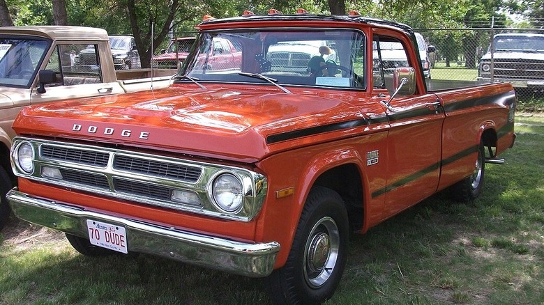 1970 Dodge Dude parked on the grass at an outdoor car show
