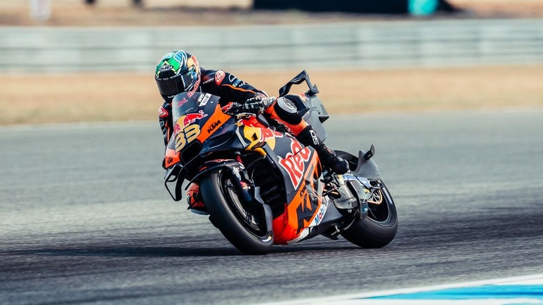 MotoGP rider Brad Binder leans into a corner on a KTM motorcycle