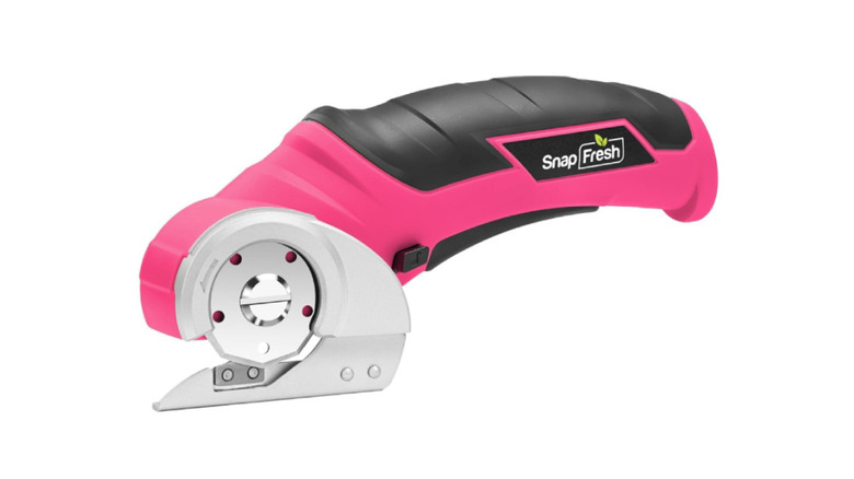 The pink model of the SnapFresh Cordless Electric Scissors on a white background