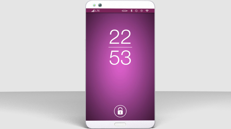 A white phone on a white table