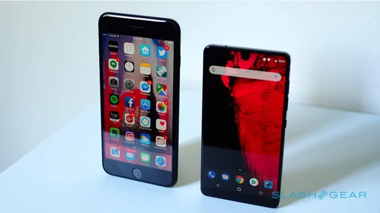 An Essential Phone sitting next to an iPhone