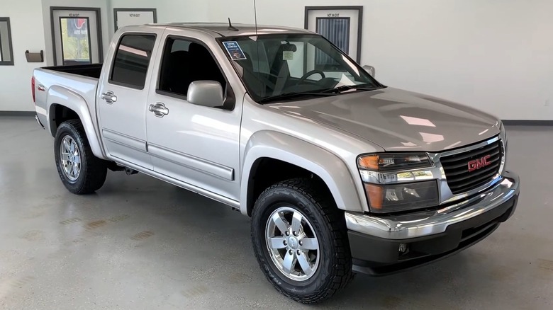 Silver 2010 GMC Canyon indoors