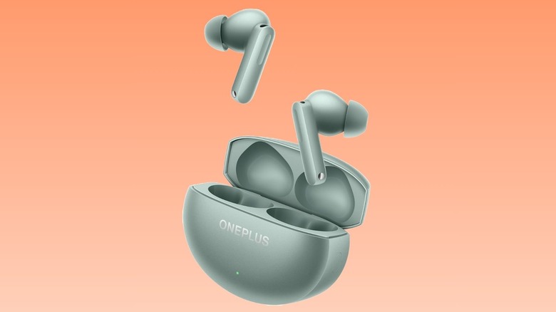 A green color OnePlus Buds 4