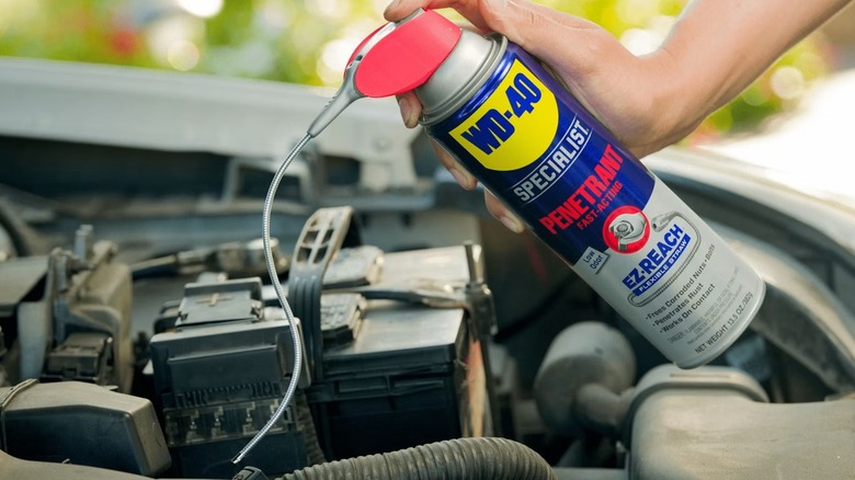 WD-40 Specialist Penetrant with EZ-Reach sprayed on a car part