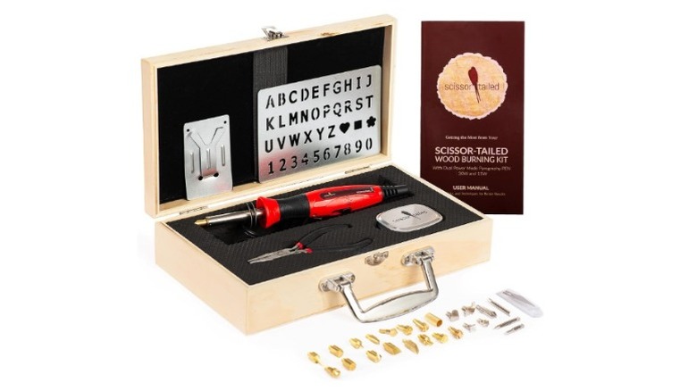 Wooden box with stencils and engraving pen