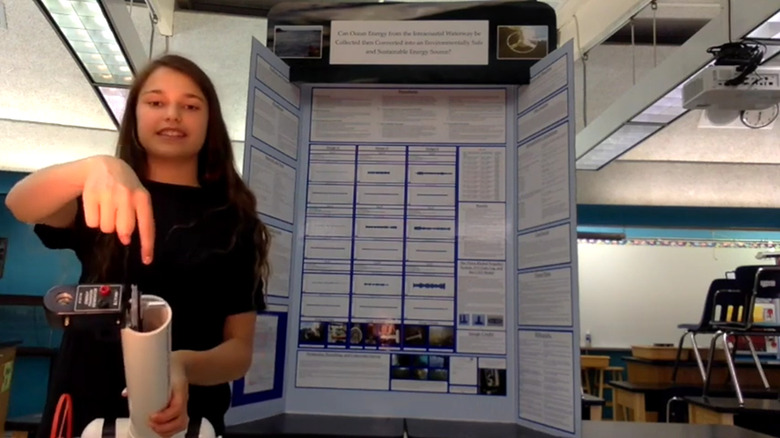 Hannah Herbst presenting her Beacon invention for a science fair