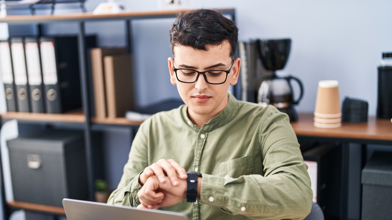 Person looking at their watch