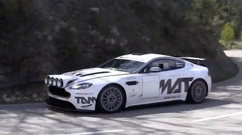 Aston Martin V8 Vantage R-GT driving down a mountain road