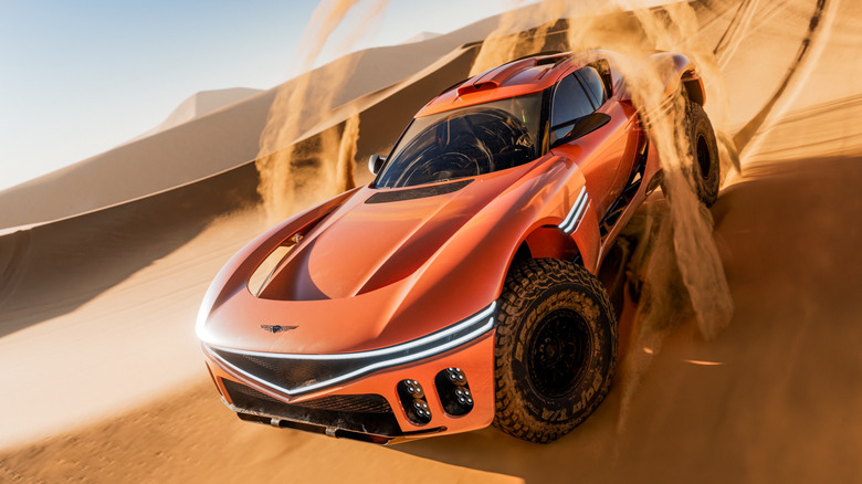 Rendering of Genesis Skorpio Concept car in orange racing across sand dunes
