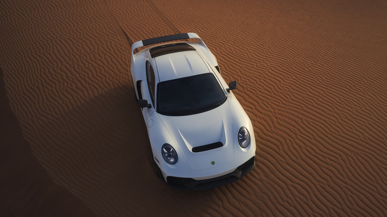 Gemball Marsien driving across a sand dune