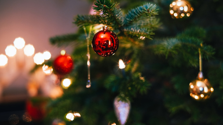 Close-up of round red Christmas tree ornament