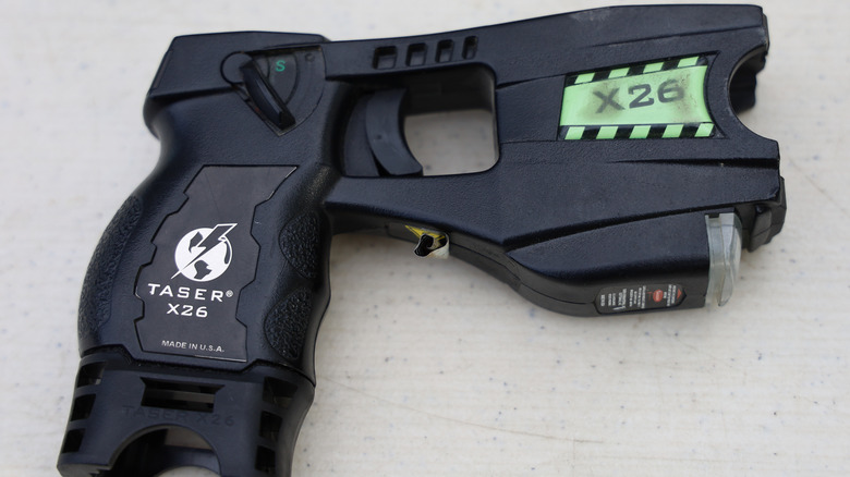 Am X26 Taser resting on the ground