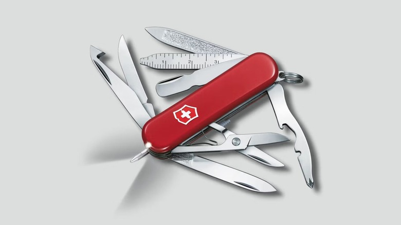 Victorinox Midnite MiniChamp pocket knife with multiple tools out