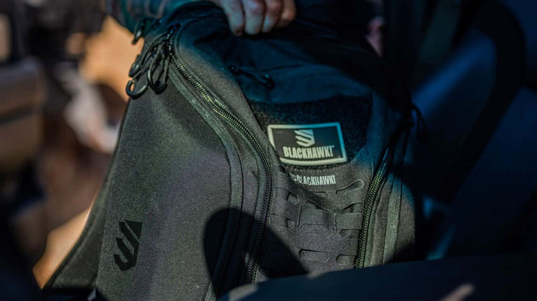 A black bag branded "Blackhawk!"